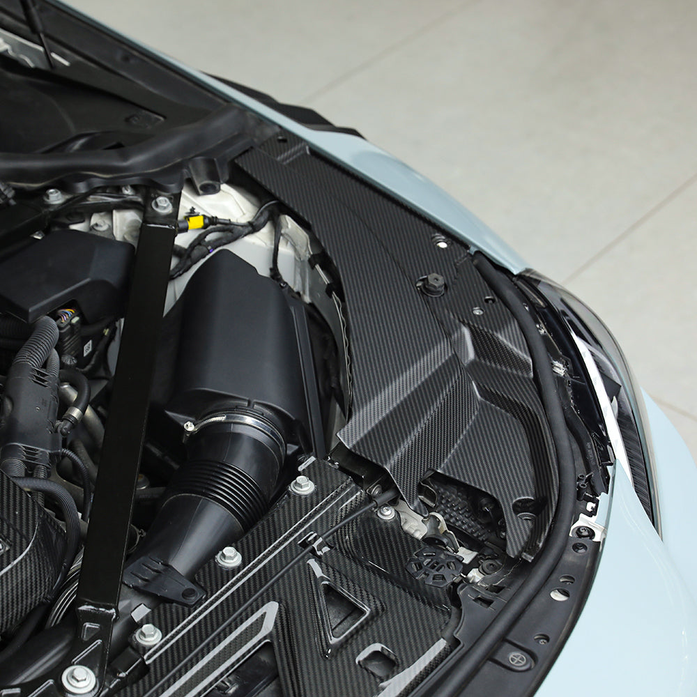 BMW M2 G87 carbon fibre engine bay trim - engine bay view