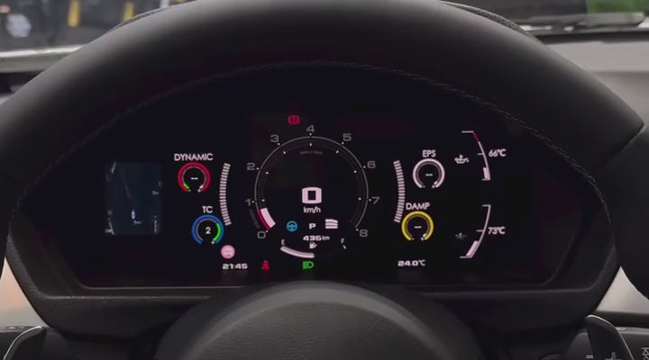 Digital dash in-car demonstration: navigation and Performance view, Race Grid, and M-style layout. Original-speed manufacturer footage, 21 seconds.