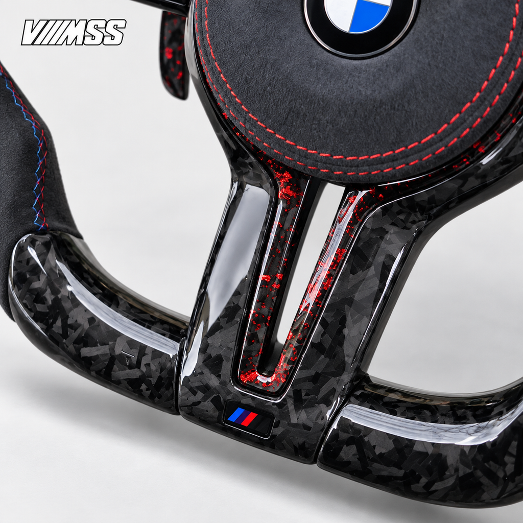 BMW F-Series Forged Carbon & Alcantara LED Steering Wheel — Centre trim and lower rim detail; VMSS studio close-up