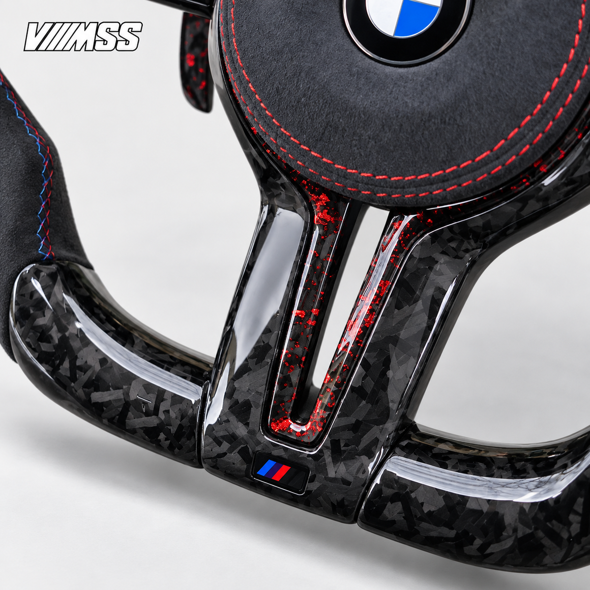 BMW F-Series Forged Carbon & Alcantara LED Steering Wheel — Centre trim and lower rim detail; VMSS studio close-up