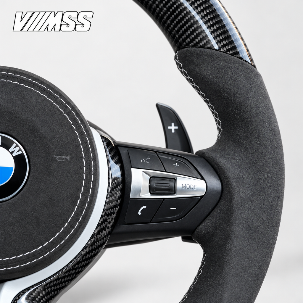BMW F-Series White-Stripe Carbon Fibre & Alcantara Steering Wheel — Grip, stitching and right control detail; VMSS studio close-up