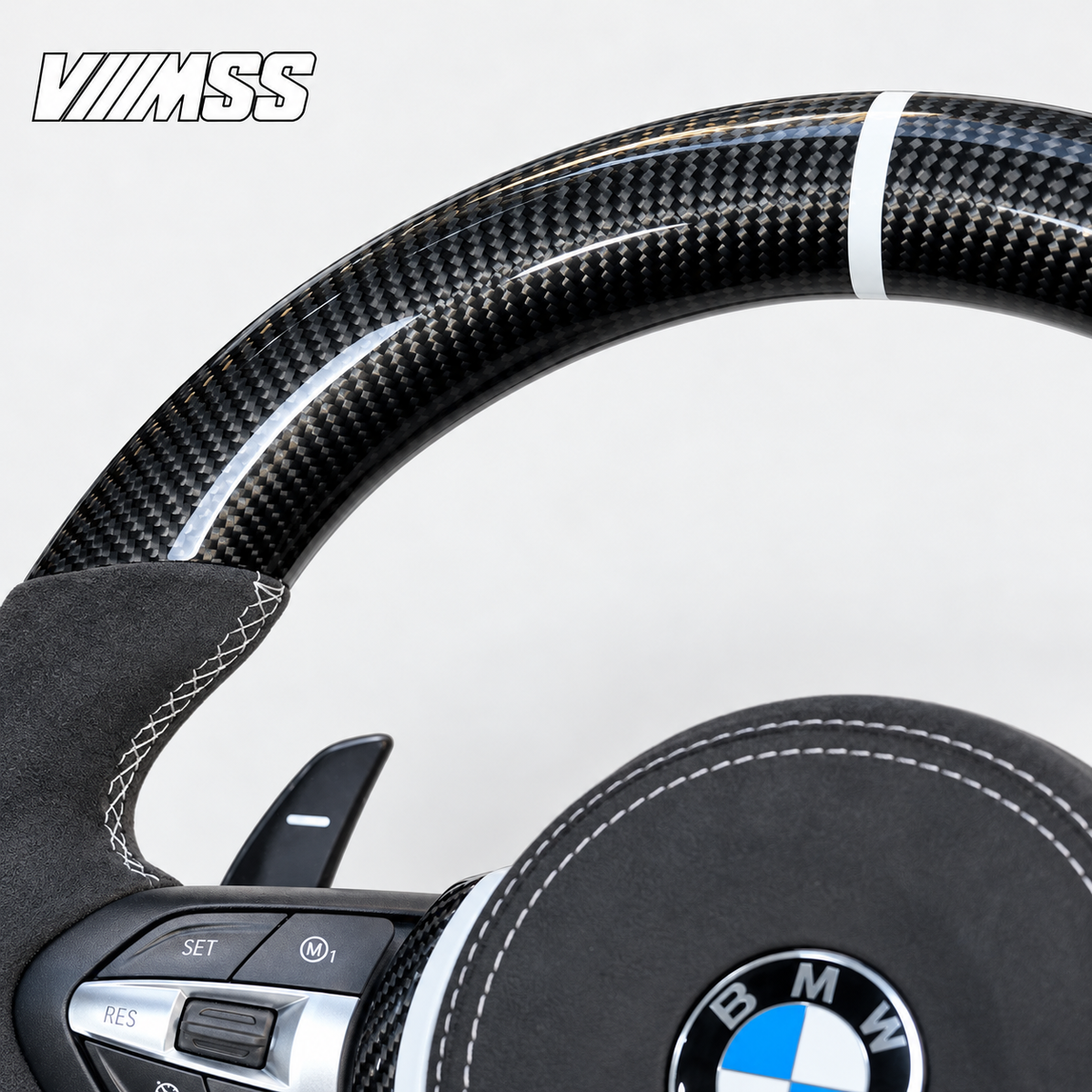BMW F-Series White-Stripe Carbon Fibre & Alcantara Steering Wheel — Upper rim and 12 o’clock detail; VMSS studio close-up