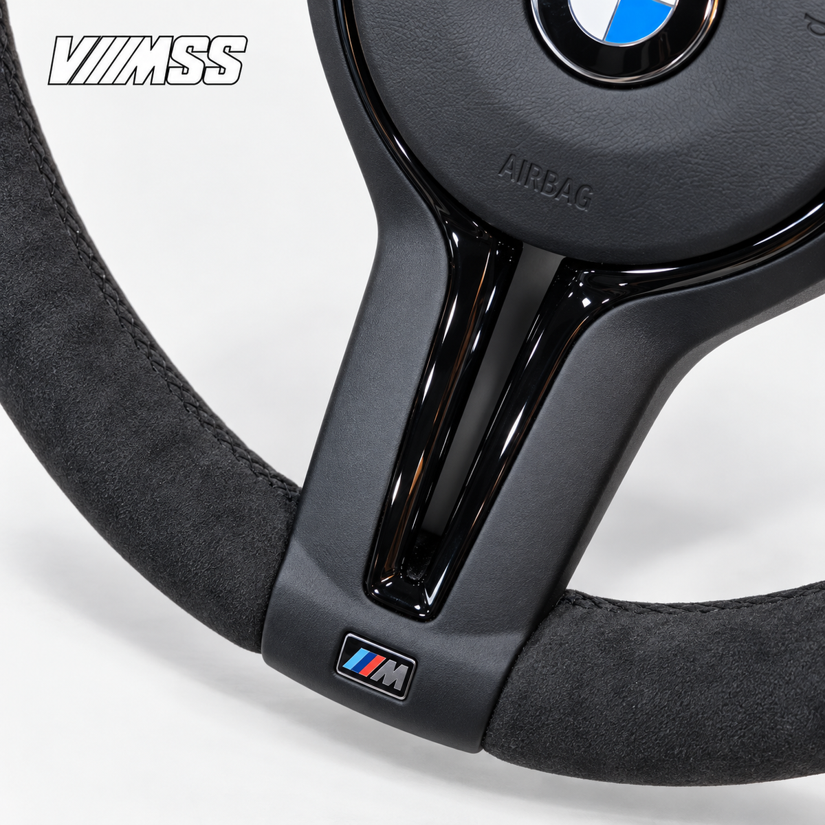 BMW F-Series CS-Inspired Full Alcantara Steering Wheel — Centre trim and lower rim detail; VMSS studio close-up