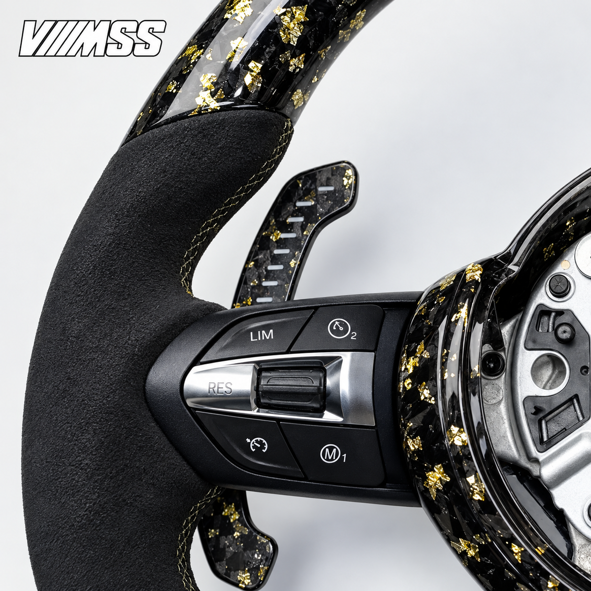 BMW F-Series Gold-Flake Forged Carbon & Alcantara LED Steering Wheel — Buttons and visible paddle detail; VMSS studio close-up
