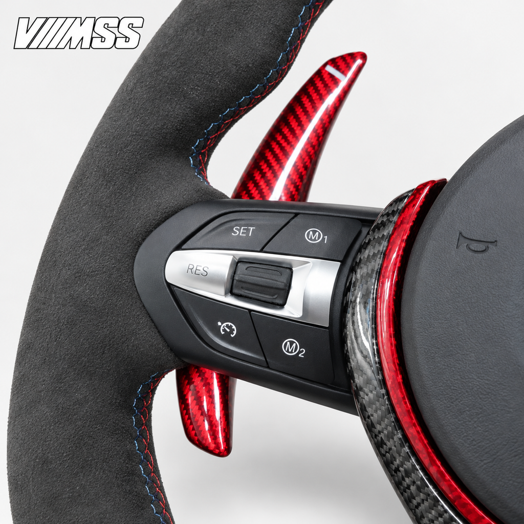 BMW F-Series Red-Stripe Leather & Alcantara — Carbon Trim Steering Wheel — Buttons and visible paddle detail; VMSS studio close-up