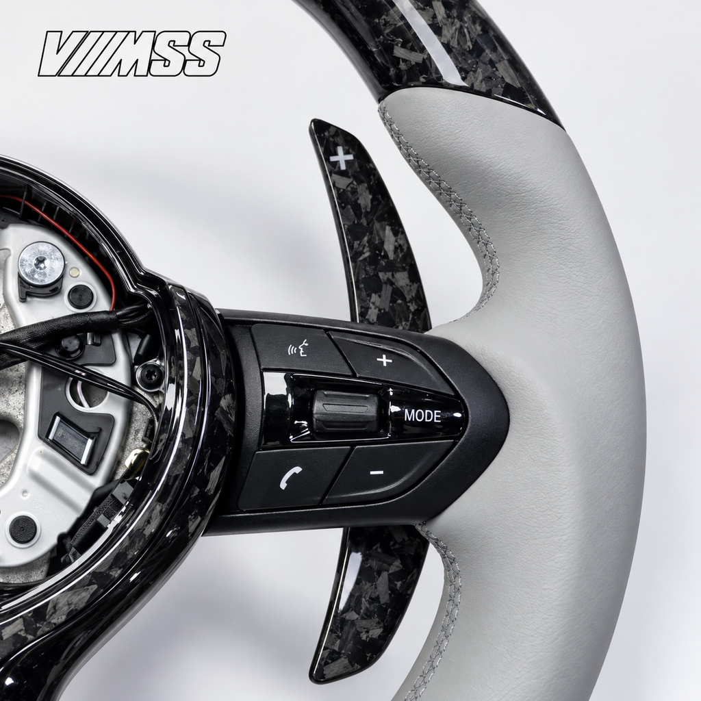 BMW F-Series Silver-Grey Leather & Forged Carbon LED Steering Wheel — Grip, stitching and right control detail; VMSS studio close-up