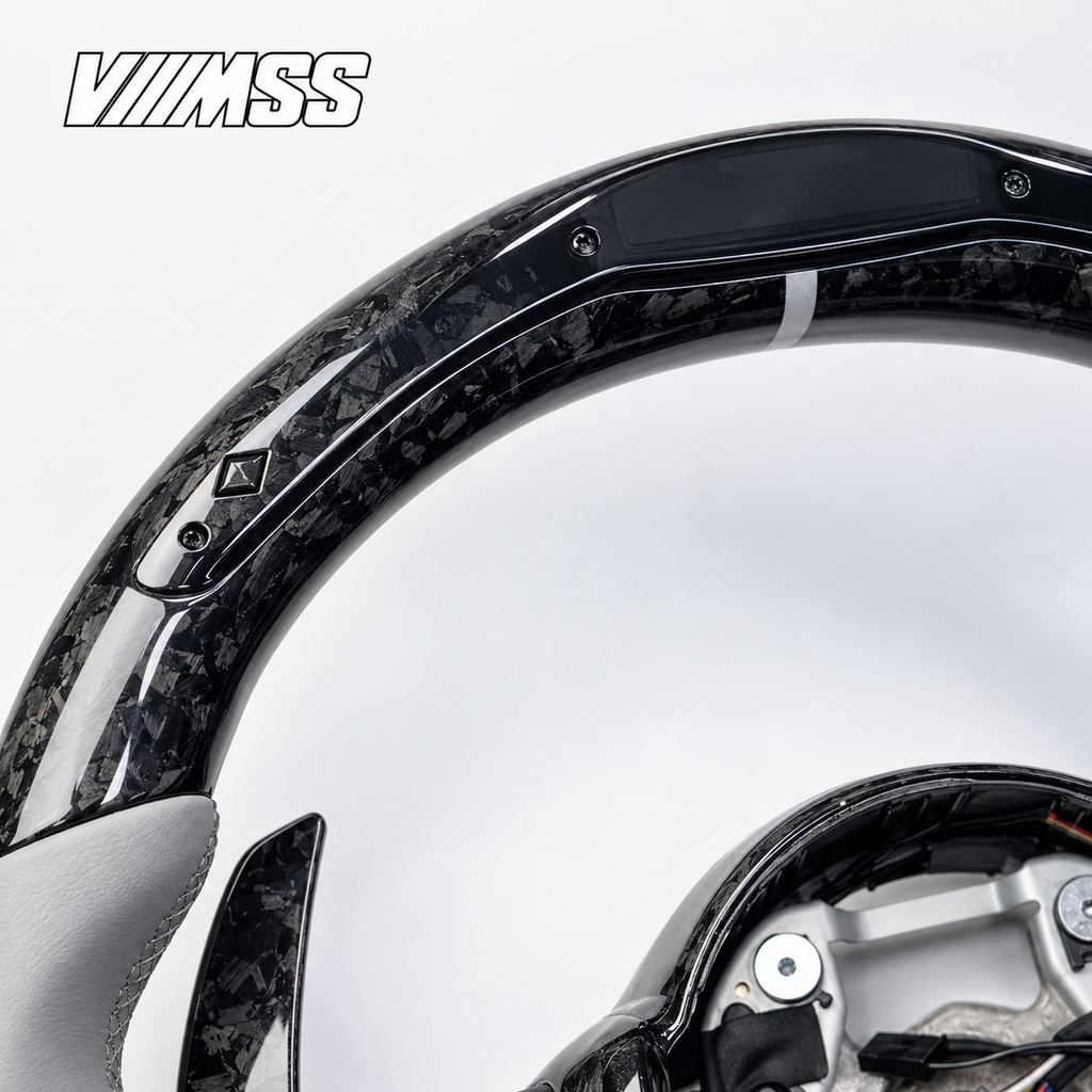 BMW F-Series Silver-Grey Leather & Forged Carbon LED Steering Wheel — Upper rim and 12 o’clock detail; VMSS studio close-up