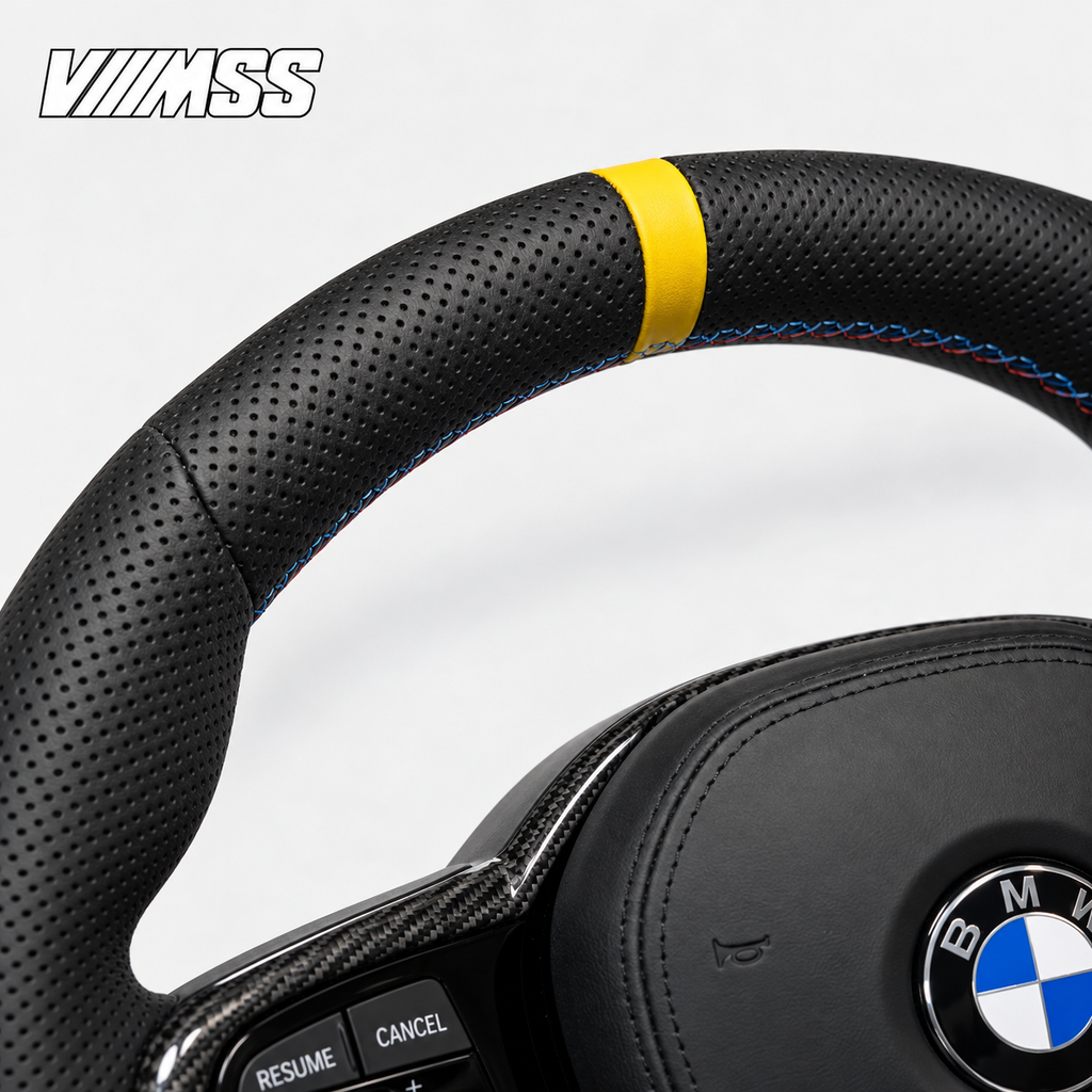 BMW G-Series Yellow-Stripe CS Perforated Leather Steering Wheel — Upper rim and 12 o’clock detail; VMSS studio close-up