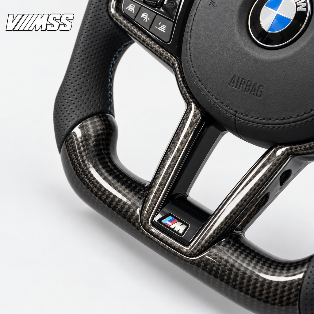 BMW G-Series CS-Style Carbon Fibre — M Stripe Steering Wheel — Centre trim and lower rim detail; VMSS studio close-up