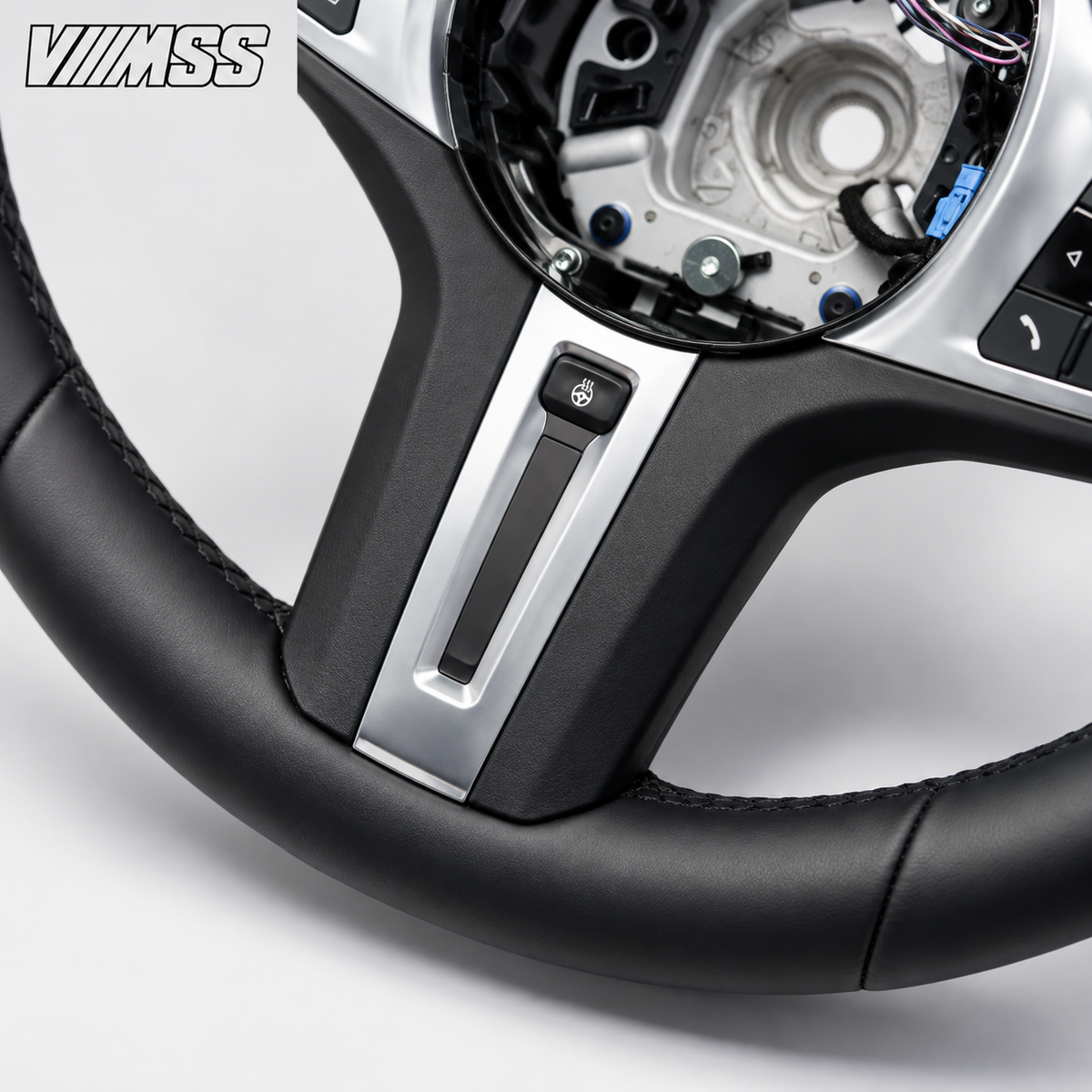 BMW G-Series Nappa Leather Sport — Silver Trim Steering Wheel — Centre trim and lower rim detail; VMSS studio close-up