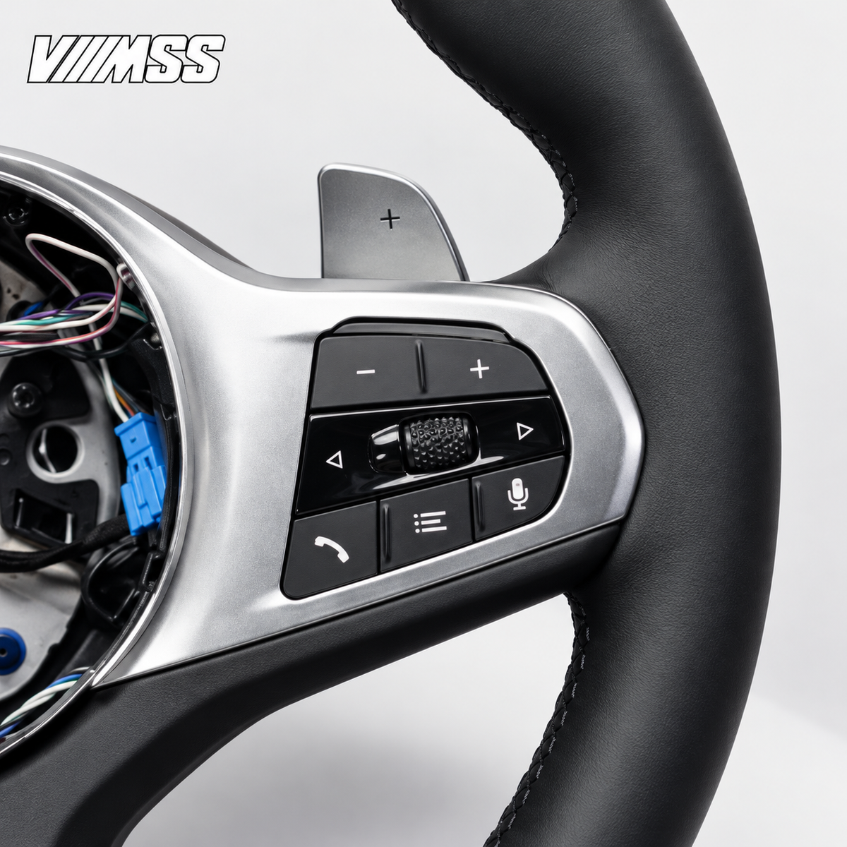 BMW G-Series Nappa Leather Sport — Silver Trim Steering Wheel — Grip, stitching and right control detail; VMSS studio close-up