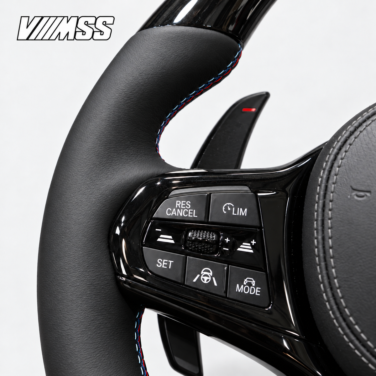 BMW G-Series Forged Carbon & Leather — M Stripe Steering Wheel — Buttons and visible paddle detail; VMSS studio close-up