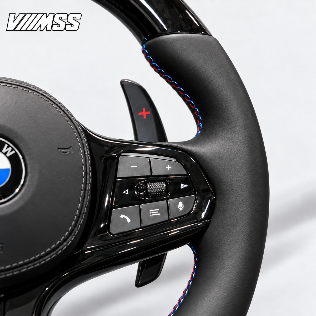 BMW G-Series Forged Carbon & Leather — M Stripe Steering Wheel — Grip, stitching and right control detail; VMSS studio close-up