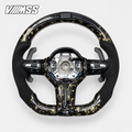BMW F-Series Gold-Flake Forged Carbon & Alcantara LED Steering Wheel — VMSS studio photograph, view 1