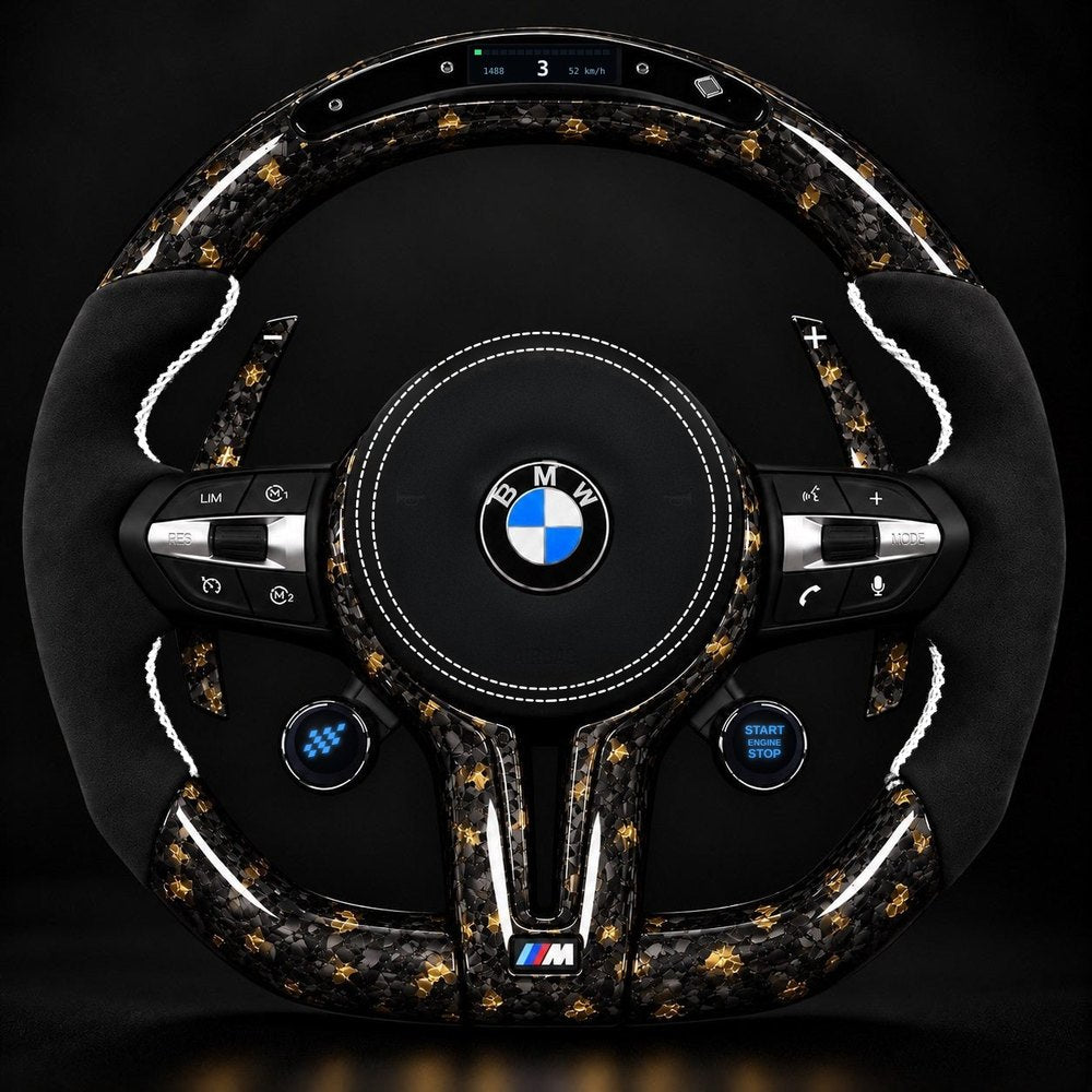 Custom BMW M steering wheel in gold flake forged carbon and Alcantara with LED rev display and OLED knobs