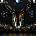 OLED display knobs on an F Series custom BMW M steering wheel